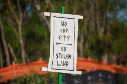 A sign is seen during a protest at the site of the Atlanta police training center, derisively called "Cop City", days after more than five dozen activists were charged with an illegal conspiracy to stop construction of the facility near Atlanta, Georgia, U.S., September 7, 2023. Photo by Megan Varner/REUTERS