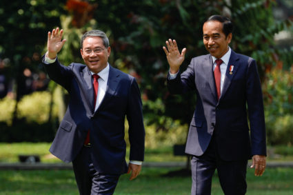 Chinese Premier Li Qiang and Indonesian President Joko Widodo wave to journalists as they walk in the Presidential Palace's garden as they meet in Jakarta, Indonesia, September 8, 2023. Photo by Willy Kurniawan/REUTERS