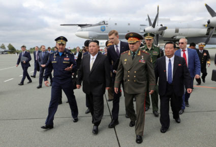 North Korean Kim looks at military aircraft and missiles near Vladivostok