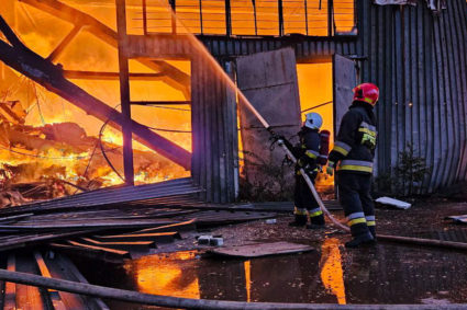 Firefighters work at a site of an industrial warehouse damaged by a Russian drone strike, amid Russia's attack on Ukraine, in Lviv, Ukraine September 19, 2023. Photo provide by the press service of the State Emergency Service of Ukraine/Handout via REUTERS