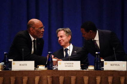 Haitian Prime Minister Ariel Henry, left, greets Kenyan Cabinet Secretary for Foreign and Diaspora Affairs Alfred Nganga Mutua, right, before US Secretary of State Antony Blinken addresses diplomats during a meeting on the security situation in Haiti, on the sidelines of the 78th United Nations General Assembly at the Lotte Palace Hotel in New York City, U.S., September 22, 2023. Photo by Bing Guan/REUTERS