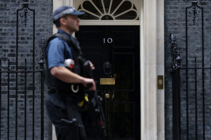 London police call for backup as officers lay down guns after colleague charged with murder