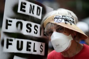 PHOTOS: Tens of thousands of activists march to kick off climate summit ...