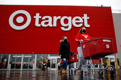 Shoppers exit a Target store during Black Friday sales in Brooklyn, New York