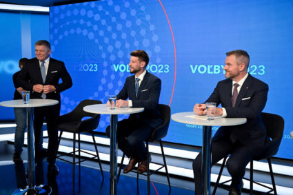 FILE PHOTO: Robert Fico, leader of the SMER-SSD party, Michal Simecka, leader of Progressive Slovakia party, and Peter Pel...