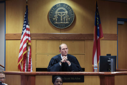 Georgia charges Trump with racketeering in election subversion case