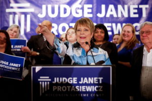 Janet Protasiewicz celebrates after the race was called for her during her election night watch party in Milwaukee, Wisconsin