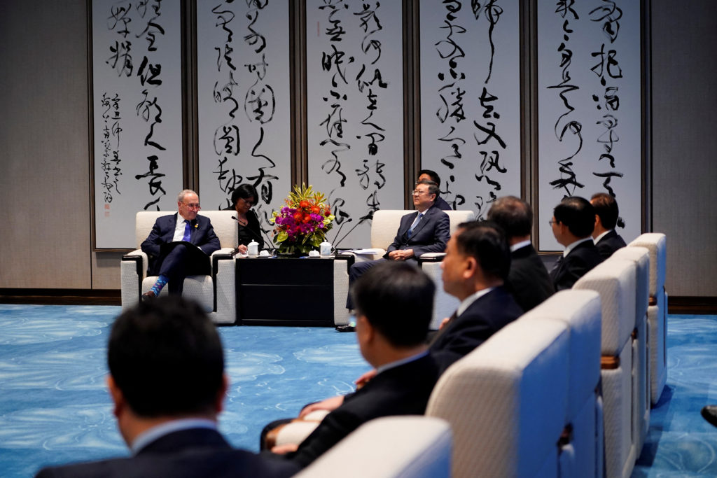 U.S. Senate Majority Leader Chuck Schumer (D-NY) talks with Shanghai Party Secretary Chen Jining, in Shanghai