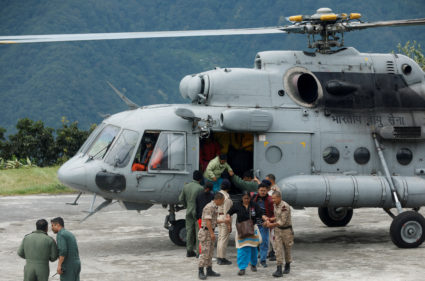 Indian rescuers fly to Himalayan region where flood washed out bridges and killed at least 74