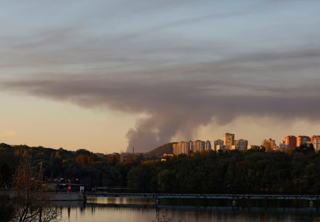 Smoke rises from the area in the direction of Avdiivka, as seen from Donetsk