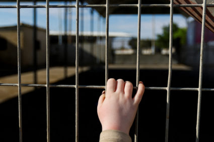 A view of the hand of a Palestinian with dual citizenship waiting outside the Rafah border crossing with Egypt in the hope of getting permission to leave Gaza, amid the ongoing Israeli-Palestinian conflict, in Rafah in the southern Gaza Strip October 17, 2023. Photo by Ibraheem Abu Mustafa/REUTERS