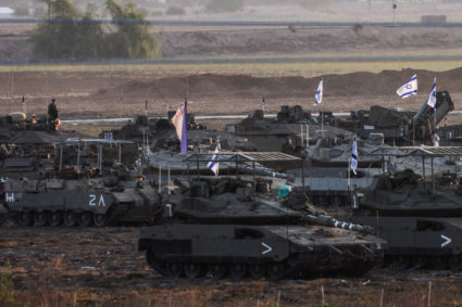 Israeli tanks and other military at Israel's border with the Gaza Strip, in southern Israel