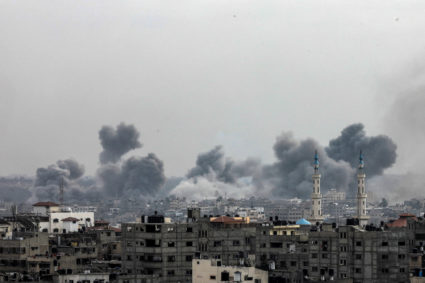 Plumes of smoke rise during Israeli strikes in Gaza