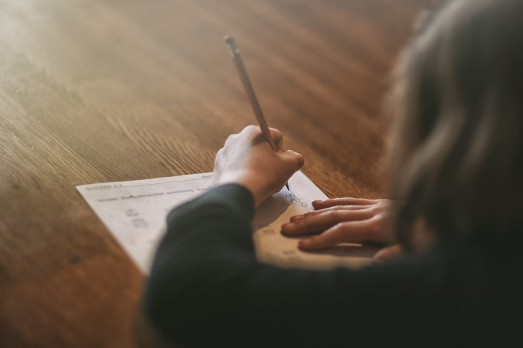 girl doing math homework