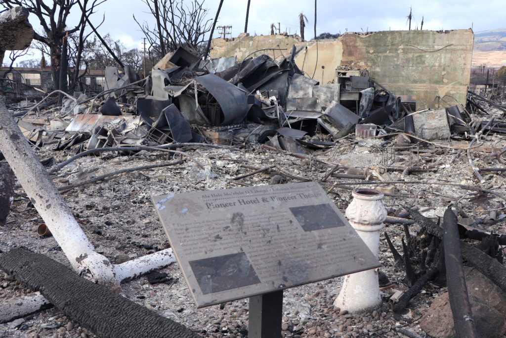 A sign at the site of the destroyed Pioneer Hotel and Pioneer Theater in Lahaina