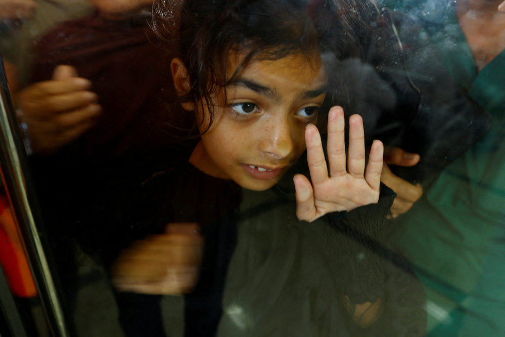 Palestinians with dual citizenship wait at the Rafah border crossing with Egypt, in the hope of getting permission to leav...