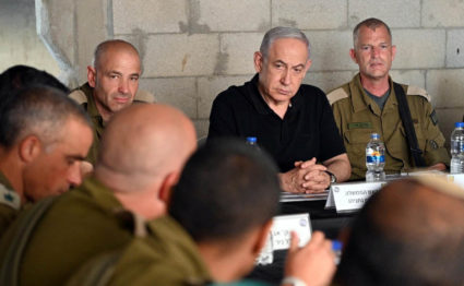 Israeli Prime Minister Benjamin Netanyahu meets with soldiers in Tze'elim