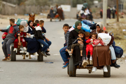 Palestinians fleeing north Gaza move southward, in the central Gaza Strip