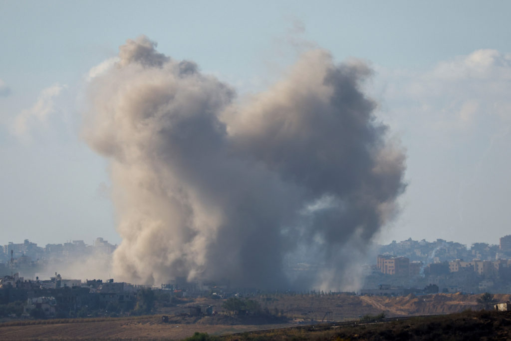 Smoke rises following an airstrike in Gaza, as seen from southern Israel