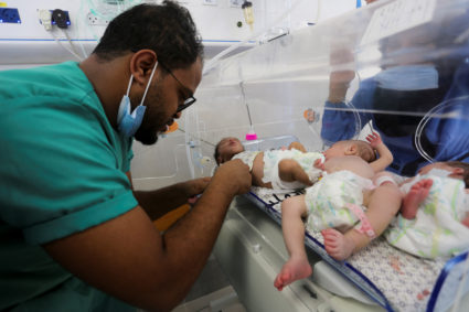 Premature babies which were evacuated from an incubator in Al Shifa Hospital in Gaza City receive treatment at an hospital...