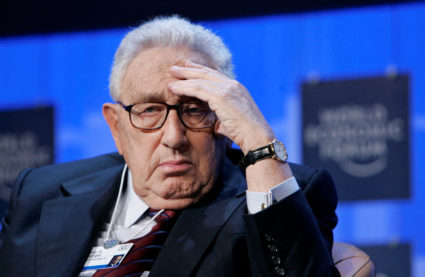 FILE PHOTO: Former US Secretary of State Kissinger attends the opening news conference of the World Economic Forum in Davos