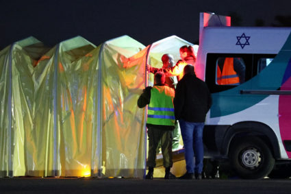 Hostages are released as part of a deal between Israel and Palestinian Islamist group Hamas