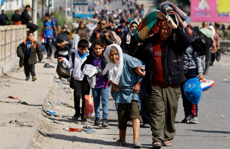 Palestinians fleeing north Gaza move southward, in the central Gaza Strip