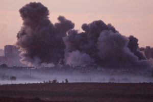 Smoke rises after Israeli air strikes in Gaza, as seen from southern Israel