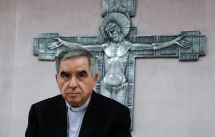 Cardinal Giovanni Angelo Becciu speaks to the media in Rome