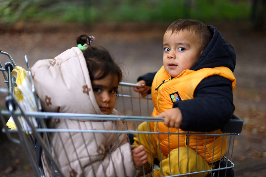 Migrants pictured at the arrival center for asylum seekers at Berlin's Reinickendorf district