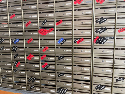 Stickers with the words "murdered", "abducted" and "released" are added by people to the respective mailboxes of the resid...