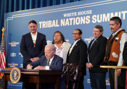 U.S. President Joe Biden signs an executive order to usher in the next era of tribal self-determination during the White House Tribal Nations Summit at the Department of the Interior in Washington, U.S., December 6, 2023. Photo by Kevin Lamarque/REUTERS