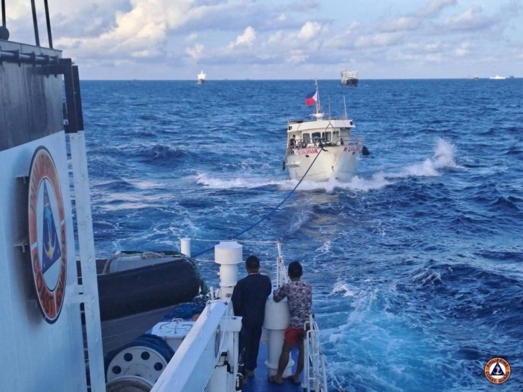 Chinese Coast Guard ship uses water cannon against a Filipino resupply vessel