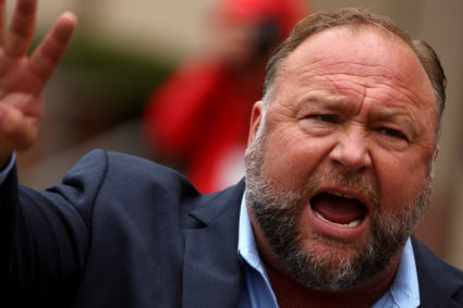 FILE PHOTO: Infowars founder Alex Jones speaks after appearing at his Sandy Hook defamation trial in Waterbury
