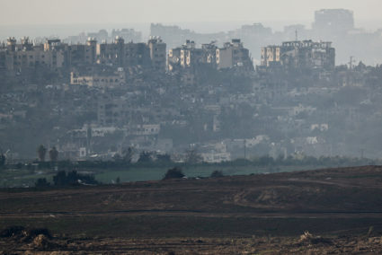 Buildings lie in ruin in Gaza, as seen from southern Israel