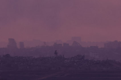 Buildings lie in ruin, in Gaza, amid the ongoing conflict between Israel and the Palestinian Islamist group Hamas, as seen from southern Israel, December 14, 2023. Photo by Clodagh Kilcoyne/REUTERS