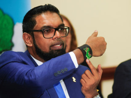 Guyana's President Irfaan Ali shows his bracelet with a map of Guyana while addressing the media after meeting with his Venezuelan counterpart Nicolas Maduro, in Kingstown, St. Vincent and the Grenadines December 14, 2023. Photo by Robertson S. Henry/REUTERS