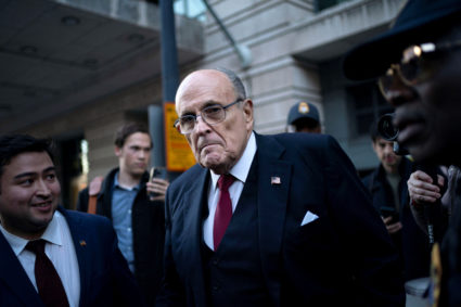 Former New York Mayor Rudy Giuliani departs the U.S. District Courthouse after he was ordered to pay $148 million in his defamation case in Washington, U.S., December 15, 2023. Photo by Bonnie Cash/REUTERS