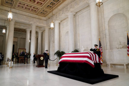 The flag-draped casket of retired Supreme Court Justice Sandra Day O’Connor lies in the Great Hall at the Supreme Court in...