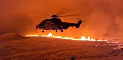 A volcano spews lava and smoke as it erupts near Grindavik