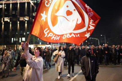 Supporters of the opposition SPN coalition protest in front of the state election commission, in Belgrade