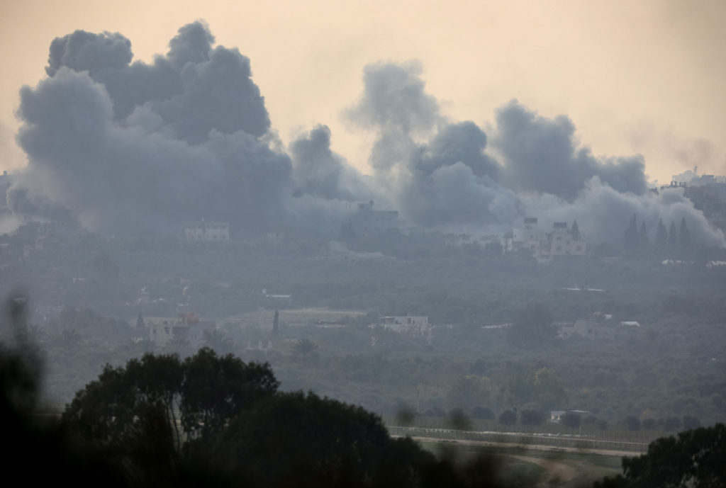 Smoke rises over Gaza following an Israeli airstrike, amid the ongoing conflict between Israel and the Palestinian Islamist group Hamas, as seen from southern Israel, December 27, 2023. Photo by Amir Cohen/REUTERS