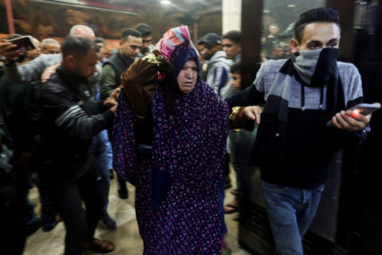 A Palestinian woman is rushed into hospital following an Israeli strike at Nasser hospital in Khan Younis