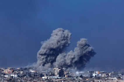 Smoke and debris rises over Gaza as seen from southern Israel