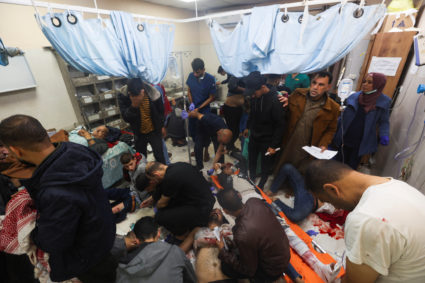 Wounded Palestinians are rushed into Nasser hospital, in Khan Younnis