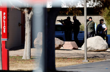 Law enforcement officers head into UNLV campus after reports of an active shooter in Las Vegas, Nevada, U.S. December 6, 2023. Photo by Steve Marcus/Las Vegas Sun via REUTERS