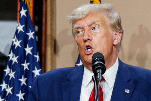 Former U.S. President and Republican presidential candidate Trump addresses auto workers as he skips the second GOP debate...