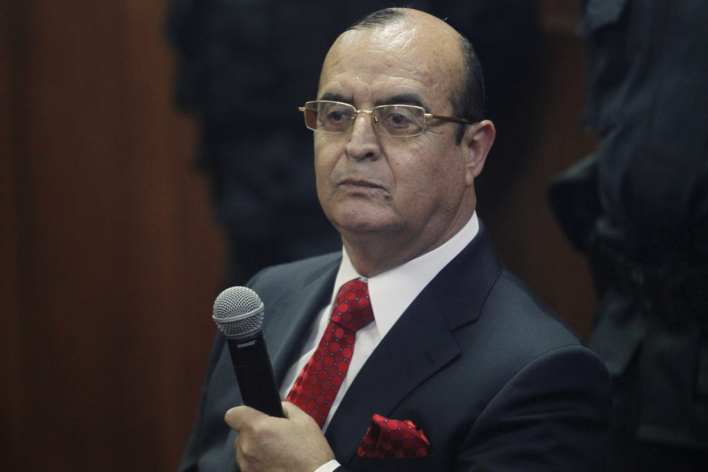 Peru's former spy chief Vladimiro Montesinos attends to the trial of former Peruvian President Alberto Fujimori at the Spe...
