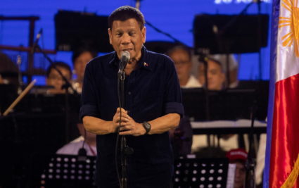 Former Philippine president accuses successor of plotting to expand power