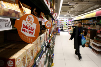 Customers shop in a Carrefour hypermarket in Paris